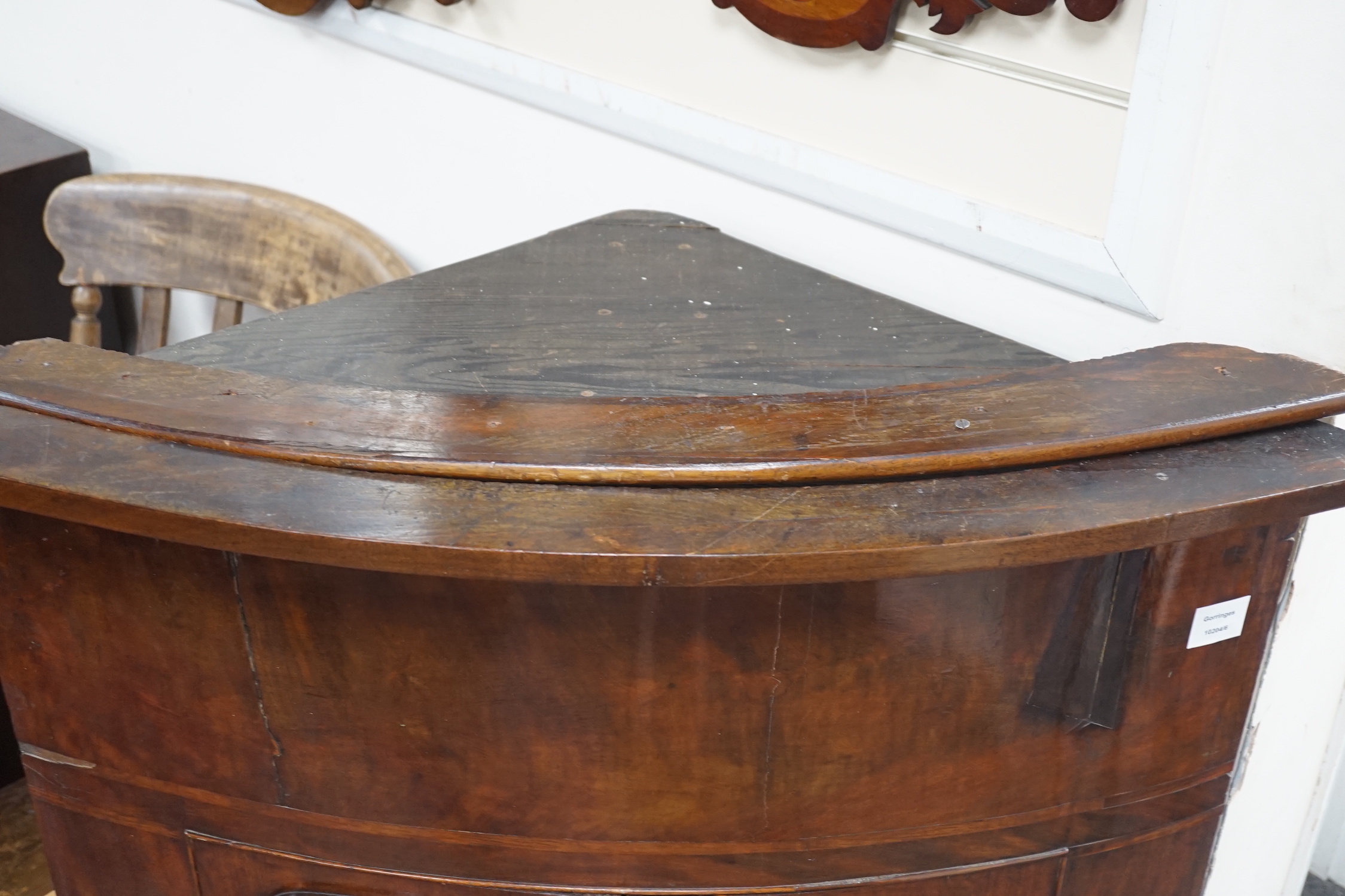 A Victorian mahogany bowfront hanging corner cupboard, width 93cm, depth 49cm, height 126cm